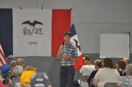 Sand touts plans for Iowa